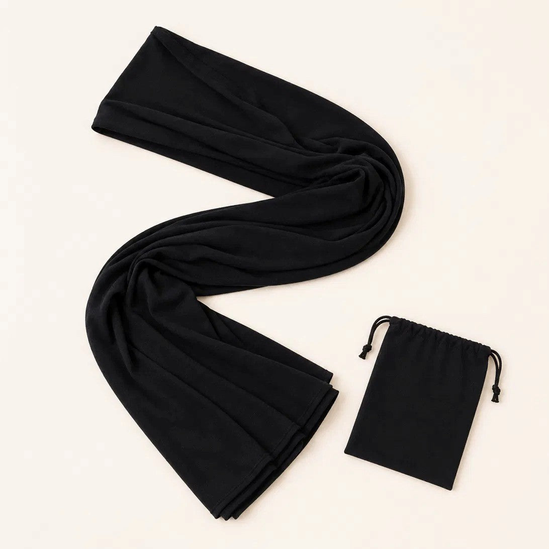 Écharpe de portage NEVA pliée avec sa pochette de rangement assortie