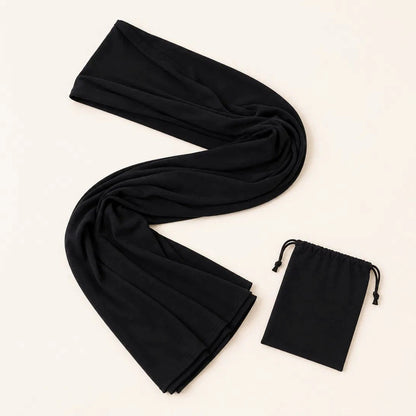 Écharpe de portage NEVA pliée avec sa pochette de rangement assortie