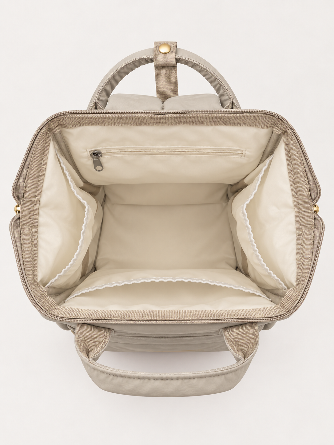 Intérieur vide du sac à langer NEVA L'Essentiel, grande ouverture et poches de rangement.
