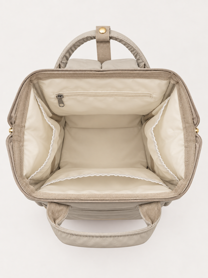 Intérieur vide du sac à langer NEVA L'Essentiel, grande ouverture et poches de rangement.